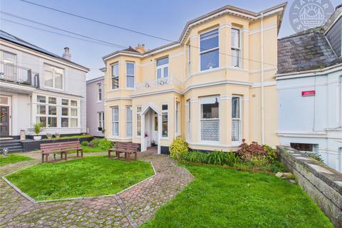 undefined, 'Start your day above the city, coffee in hand, from this top floor balcony apartment'