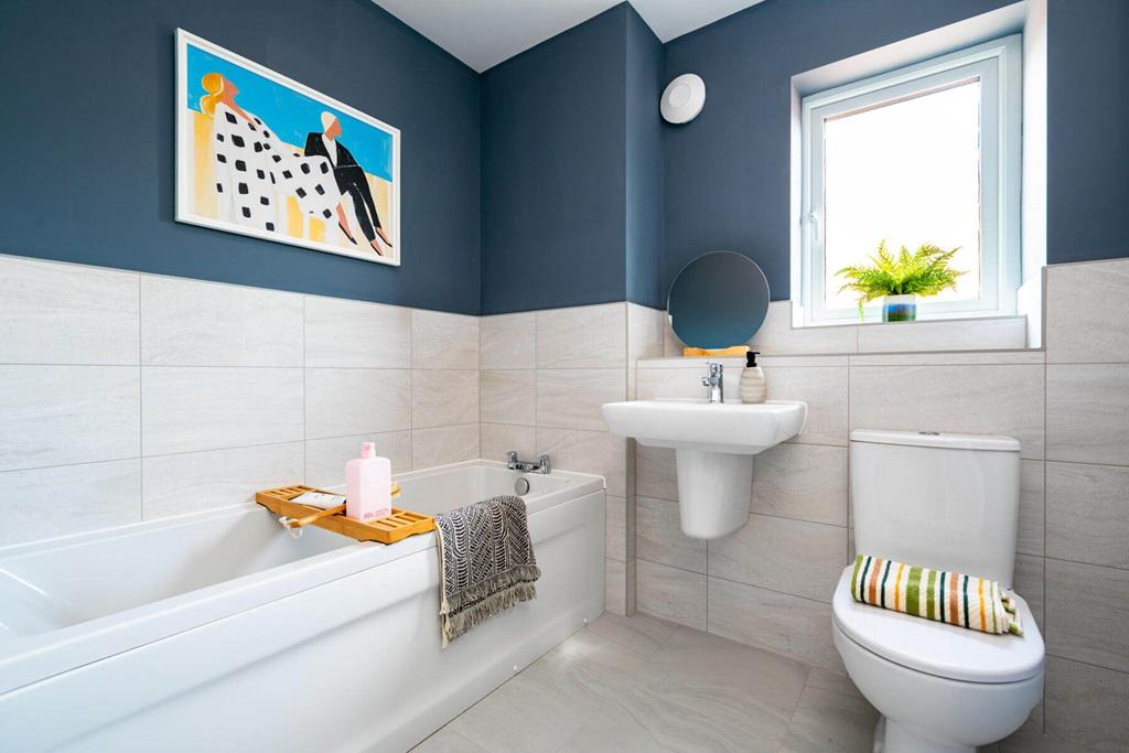 A family bathroom completes the home