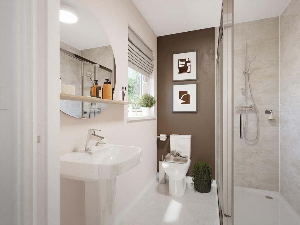 The en suite with high quality fixtures and...