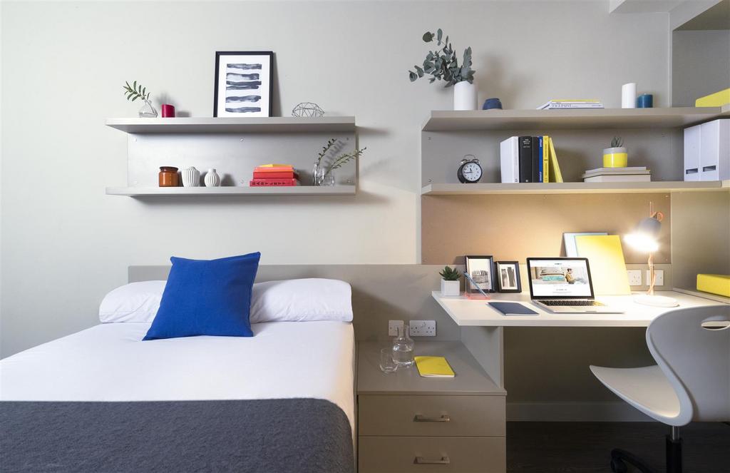 Urb St Melbourne room dressed bed and desk area.jp