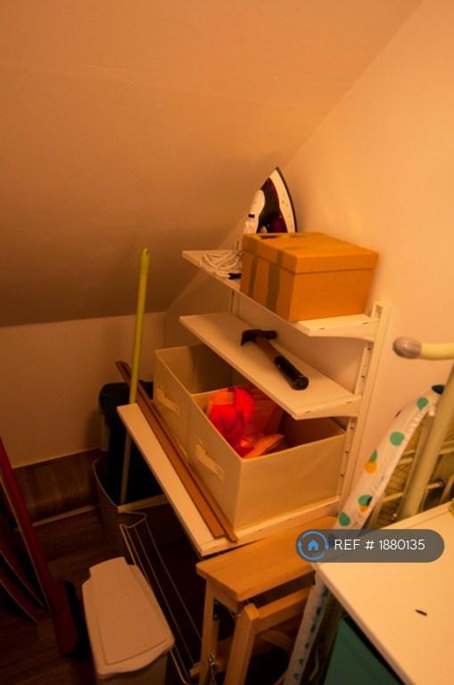 Under Stairs Storage Cupboard.