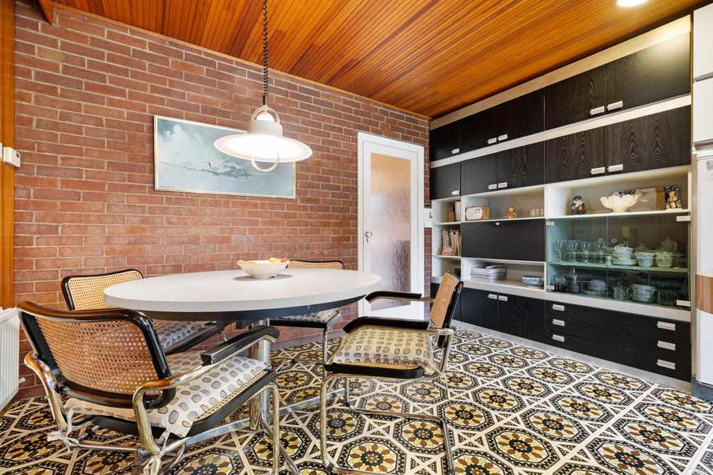 Kitchen with breakfast bar and room to dine