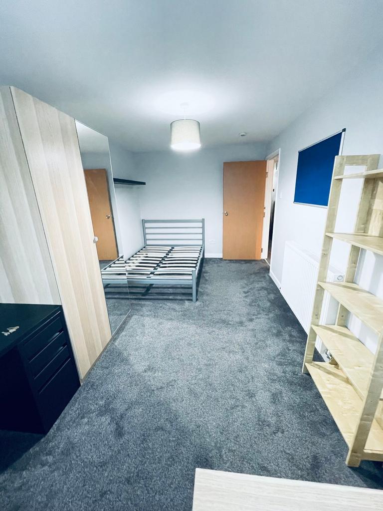 Bright, well-presented bedroom with fresh carpe...