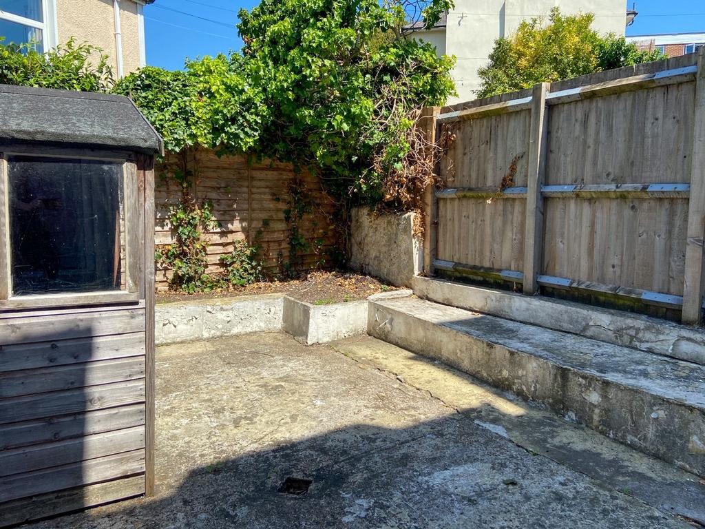 Private low-maintenance rear yard with paved se...