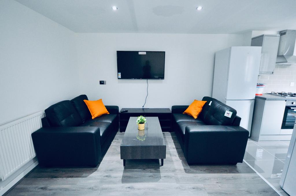 Modern and inviting living room featuring two b...