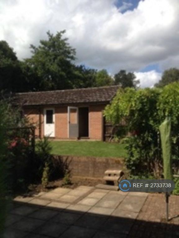 Back Garden Leading To Communal Lawn And Garage