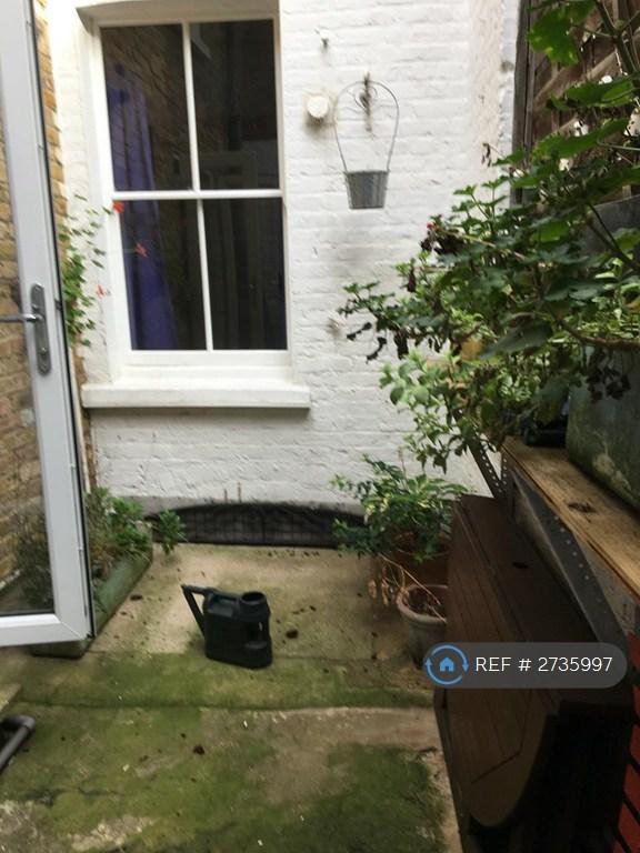 Enclosed Patio Area & Bedroom Window
