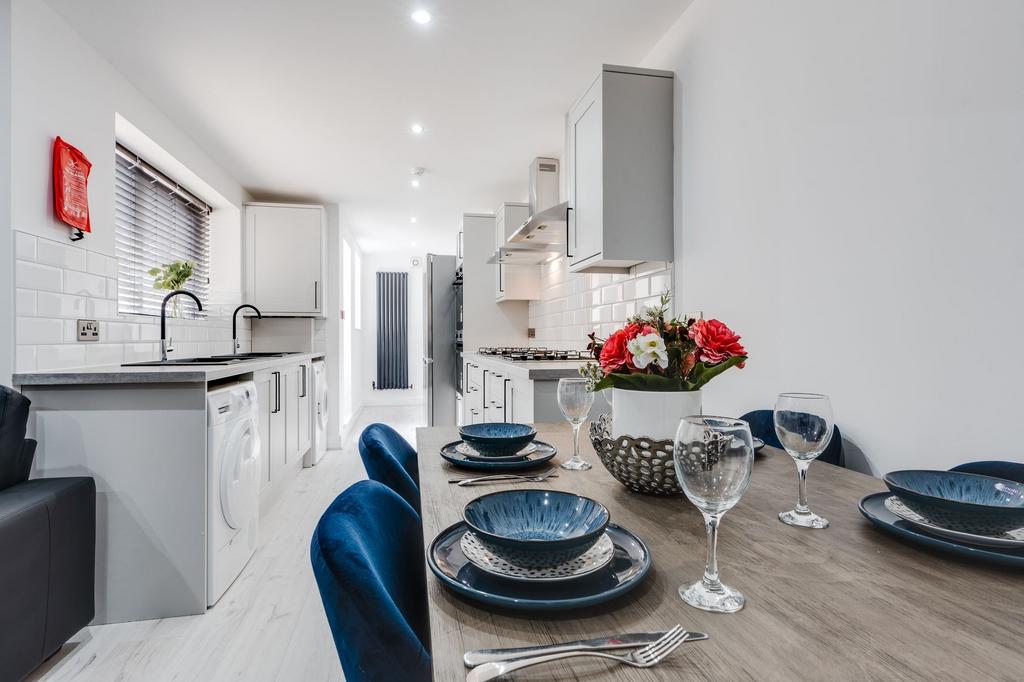 Modern and well-maintained kitchen featuring wh...
