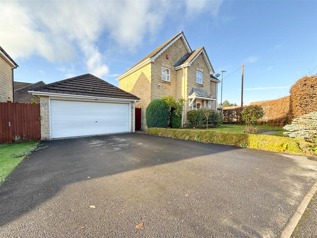 Double garage and driveway
