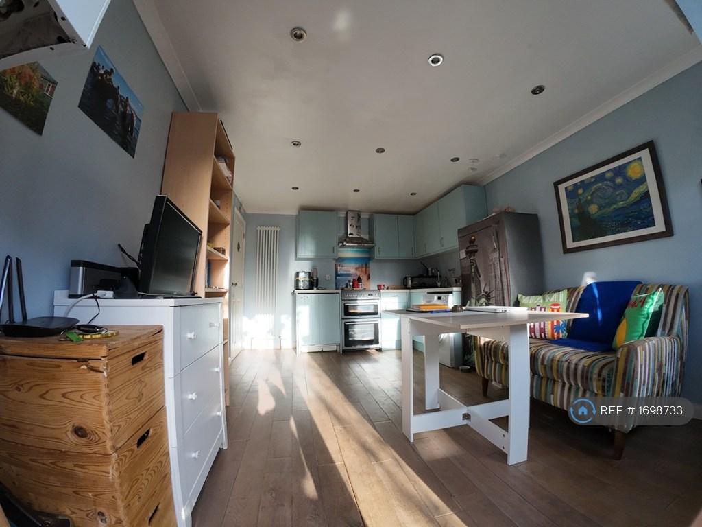 Sitting Room With Kitchenen
