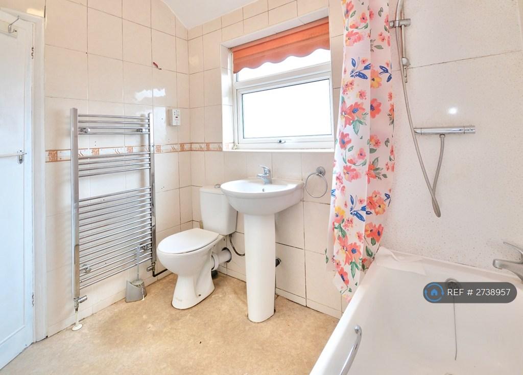 Modern Bathroom With Shower And Heated Towel Rail