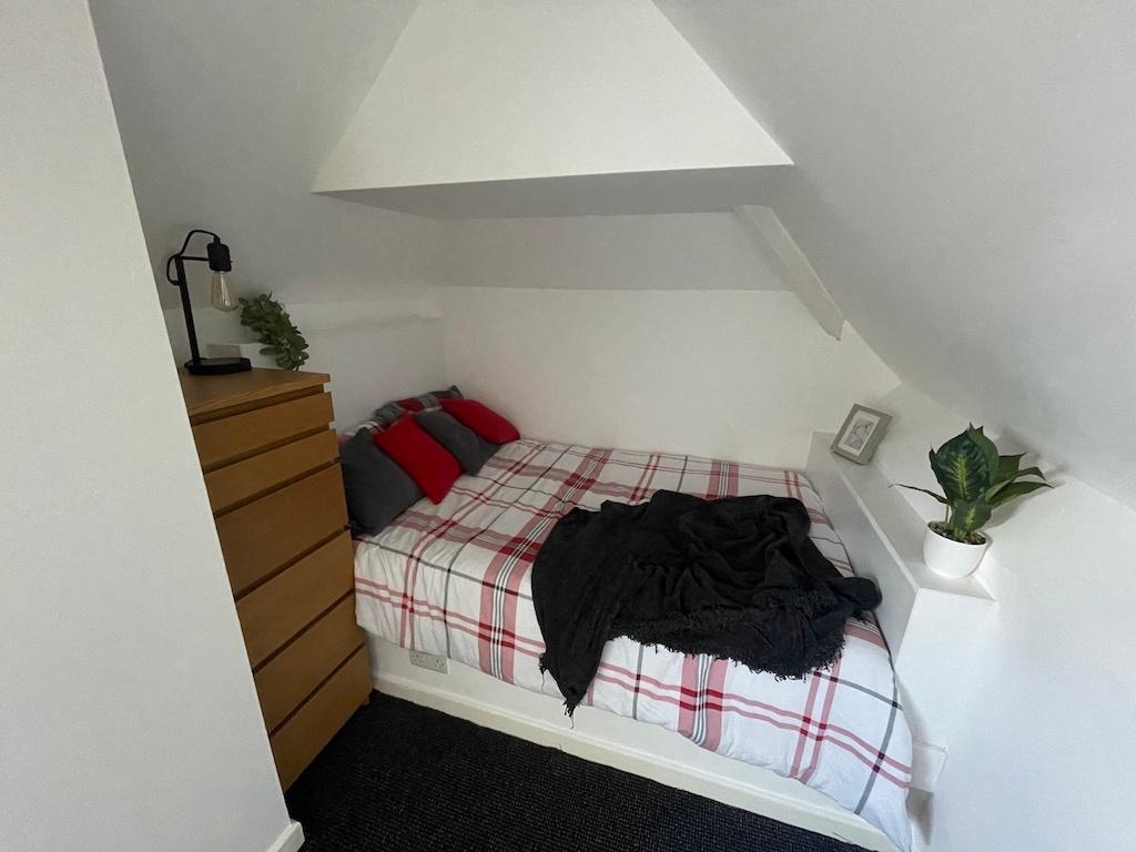 Cozy attic double bedroom with pitched ceiling,...