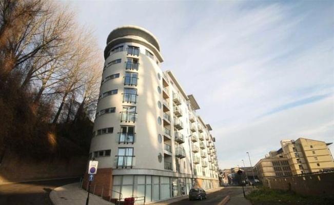 A modern multi-storey residential building with...
