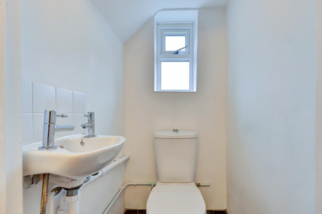 Fresh, modern WC with a compact basin, contempo...