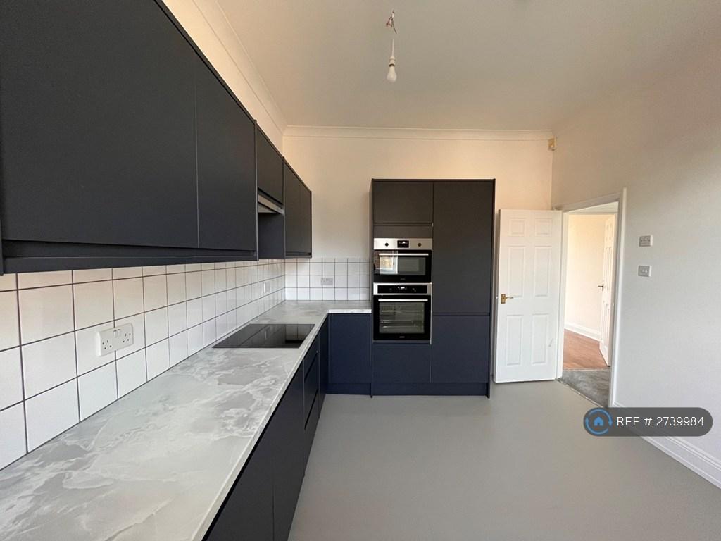 Newly Fitted Kitchen With New Floor