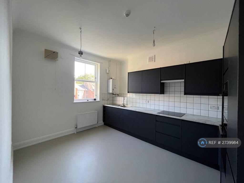 Newly Fitted Kitchen With New Floor