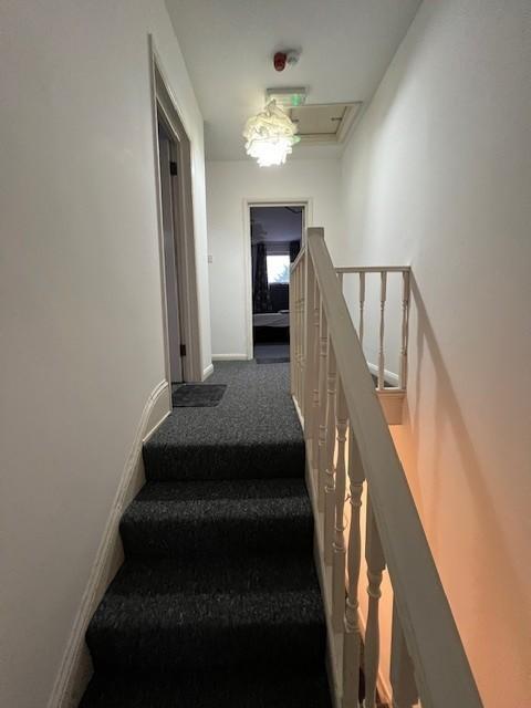 Well-maintained upstairs landing and staircase ...