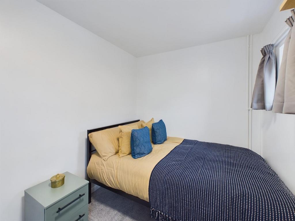 A stylish and inviting double bedroom featuring...