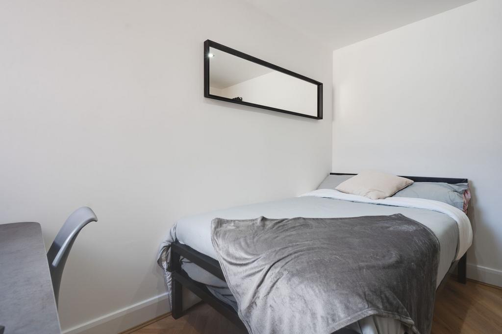 A modern, neatly maintained double bedroom feat...