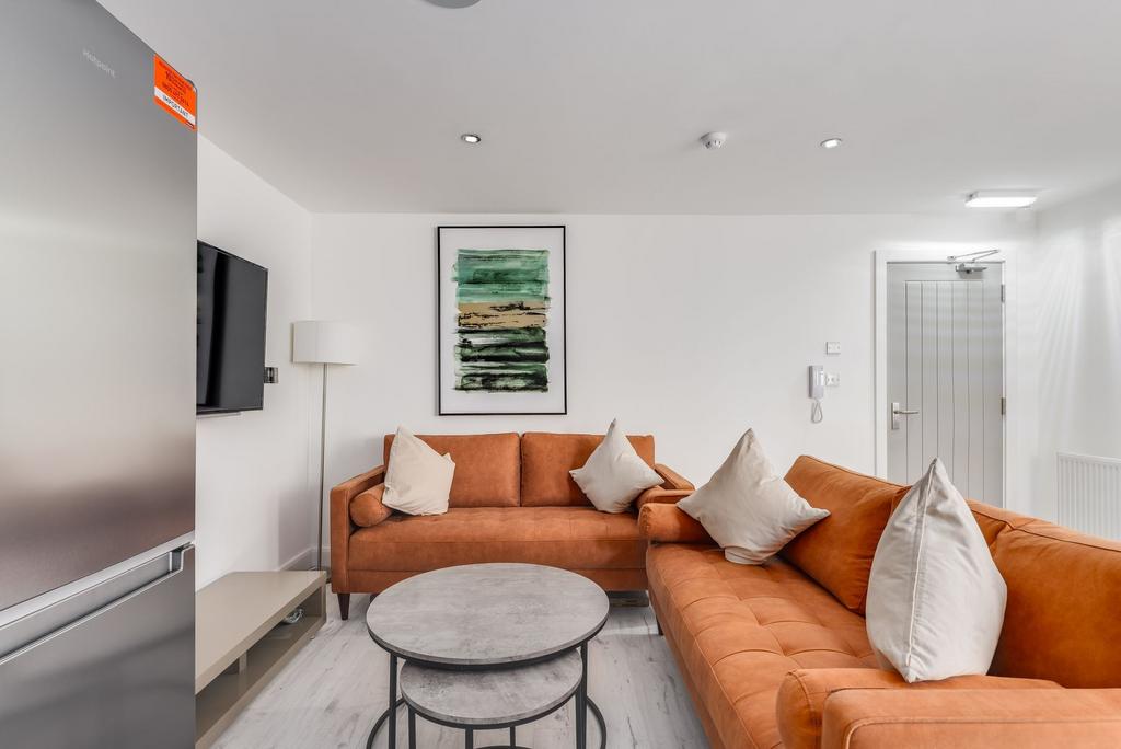 Modern and inviting living room with warm orang...