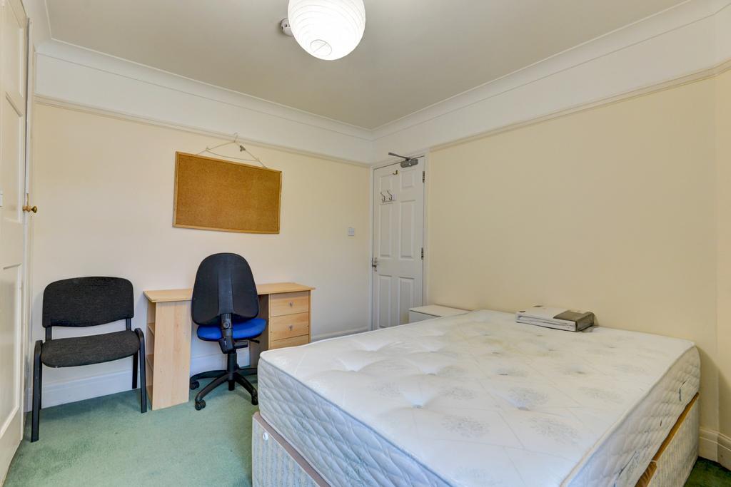 Simple furnished bedroom with a double mattress...