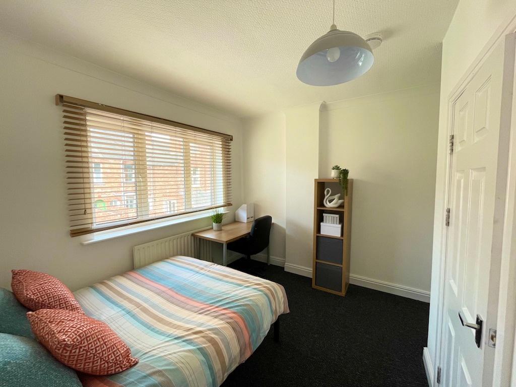 Bright, well-presented bedroom with a comfortab...