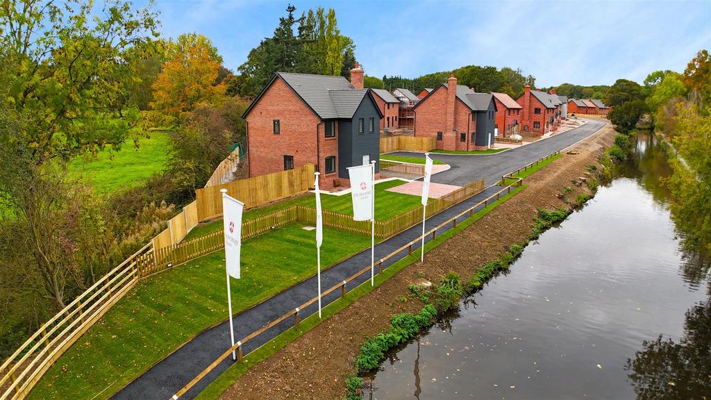 Plot with flagpoles and water.jpg