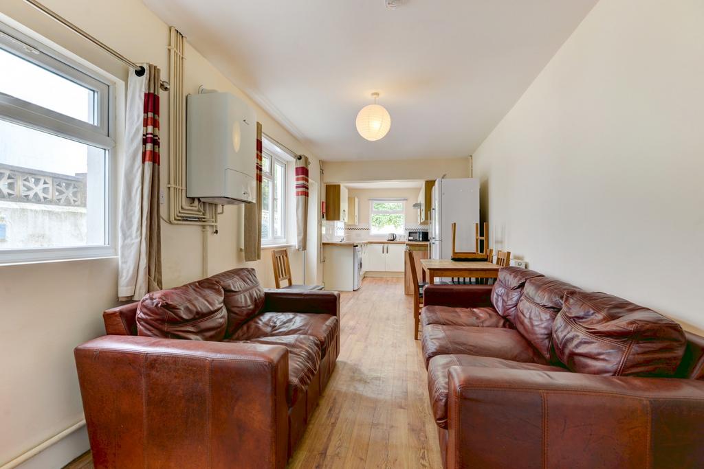 Spacious open-plan living area with comfortable...