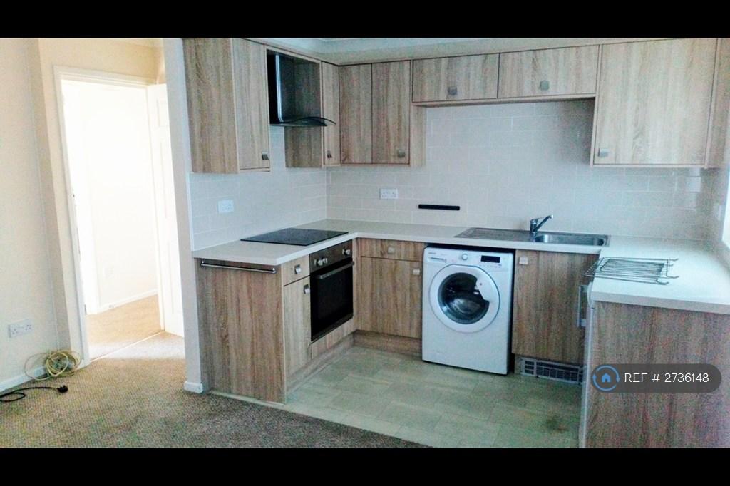 Kitchen With Washer Dryer