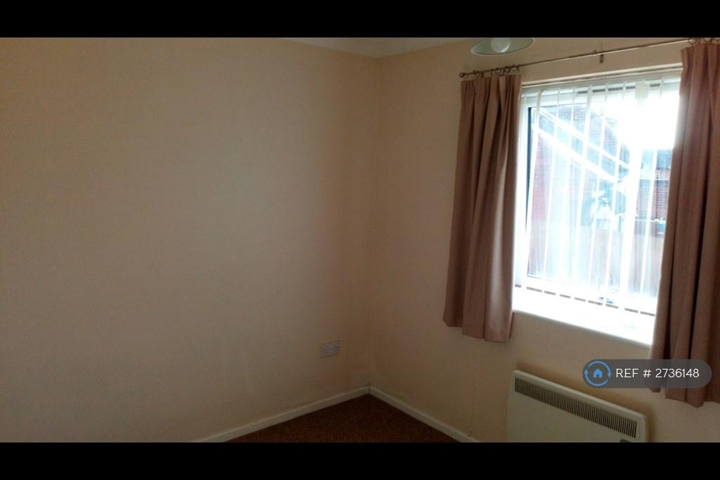 Bedroom With Electric Heater