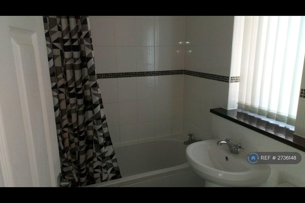 Bathroom With Bath And Shower Over