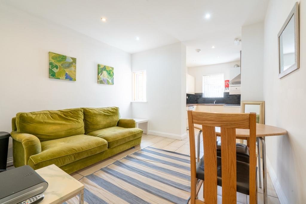 Bright and inviting living room featuring a vib...