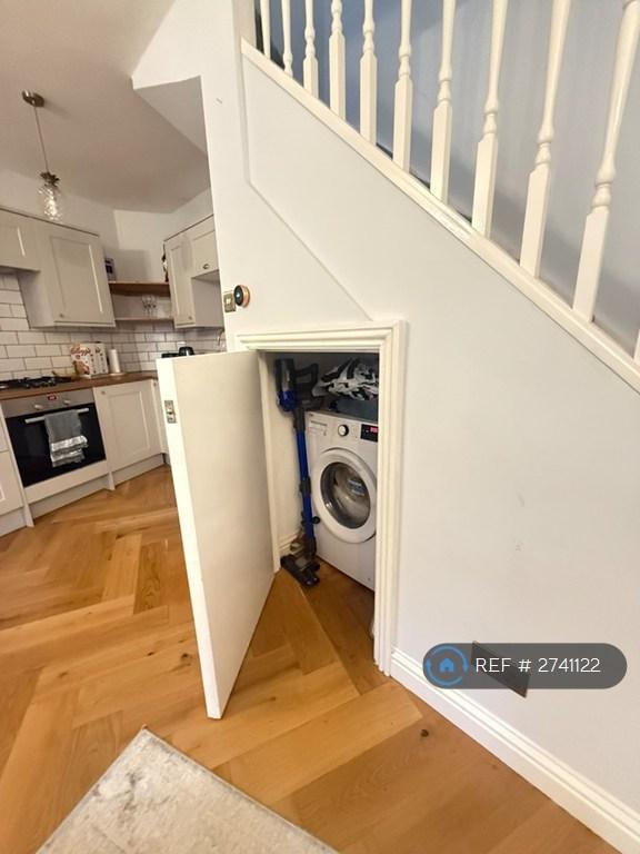 Washing Machine & Storage Under Stairs