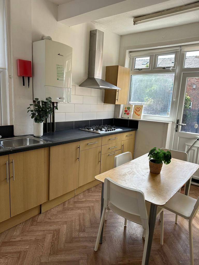 A bright and well-maintained kitchen featuring ...