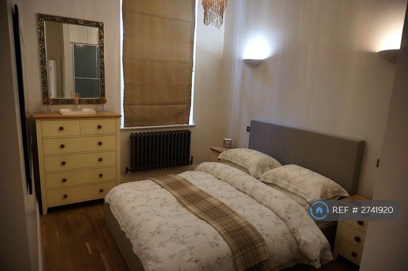 Bedroom With Full Length Blinds