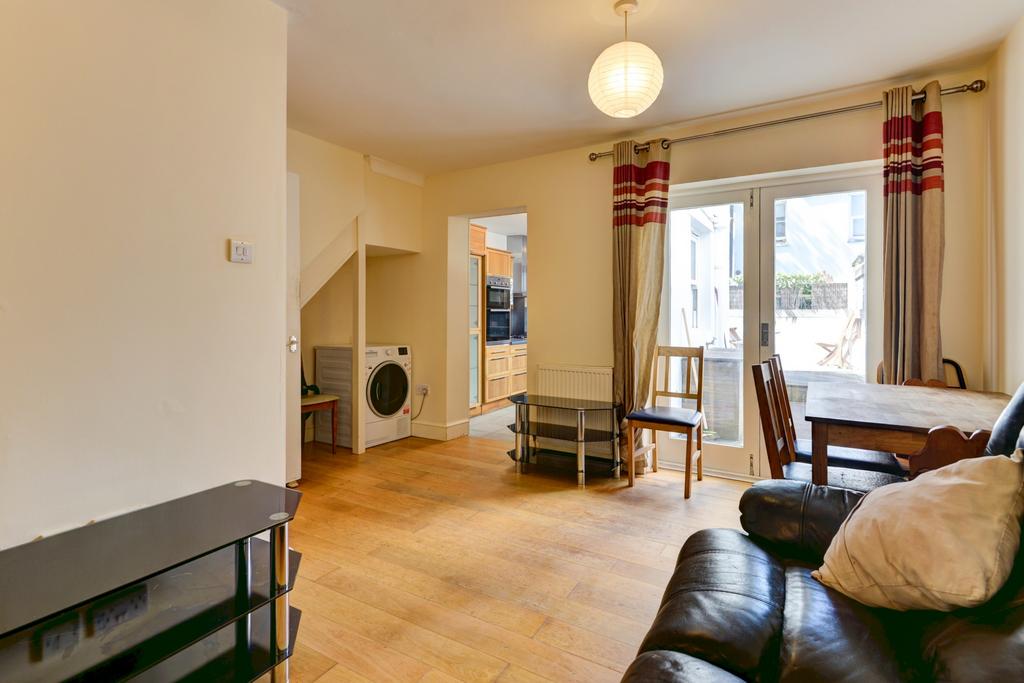 Bright, well-presented living room with wood fl...