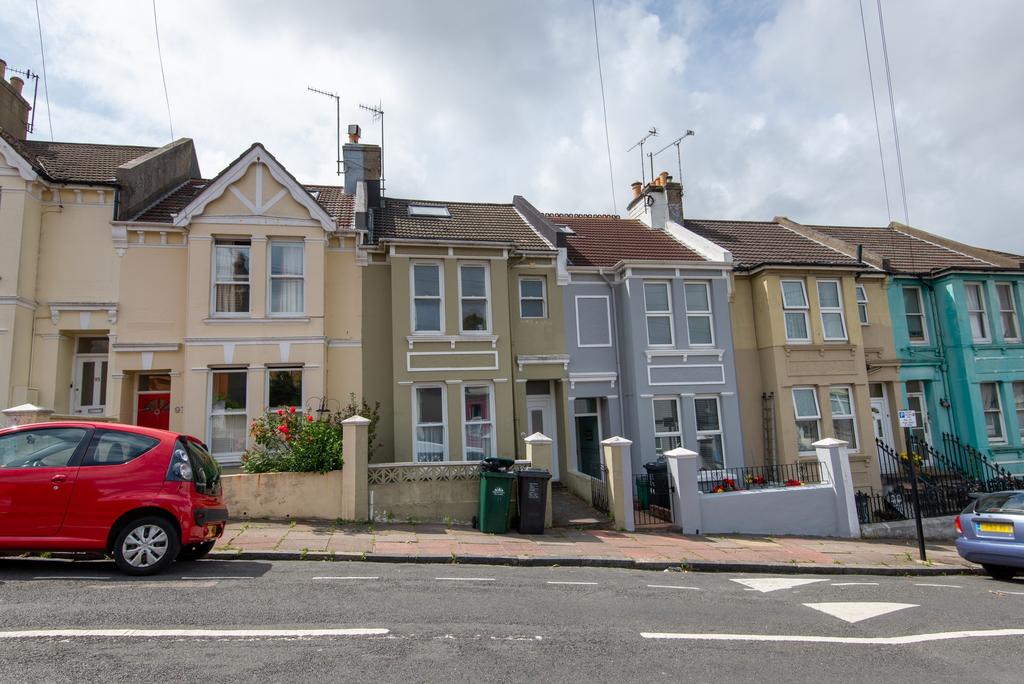 A charming row of colorful terraced houses on a...