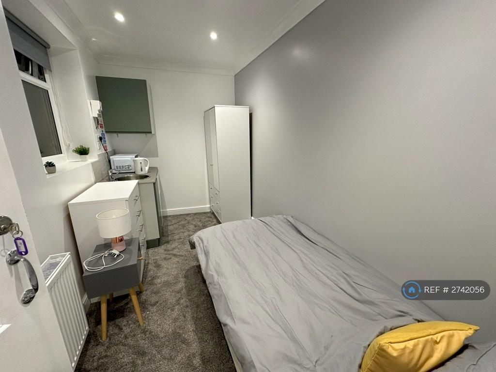 Bedroom With Kitchenette
