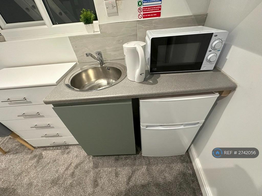 Bedroom With Kitchenette