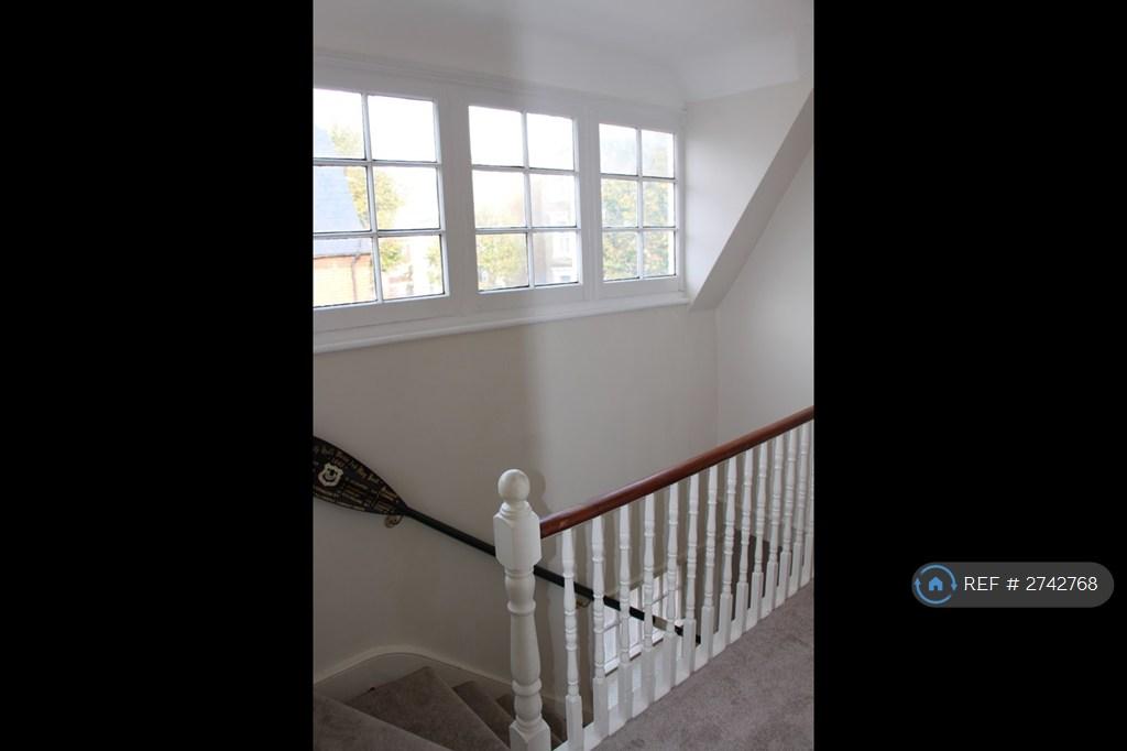 Staircase From Entrance Way To Landing