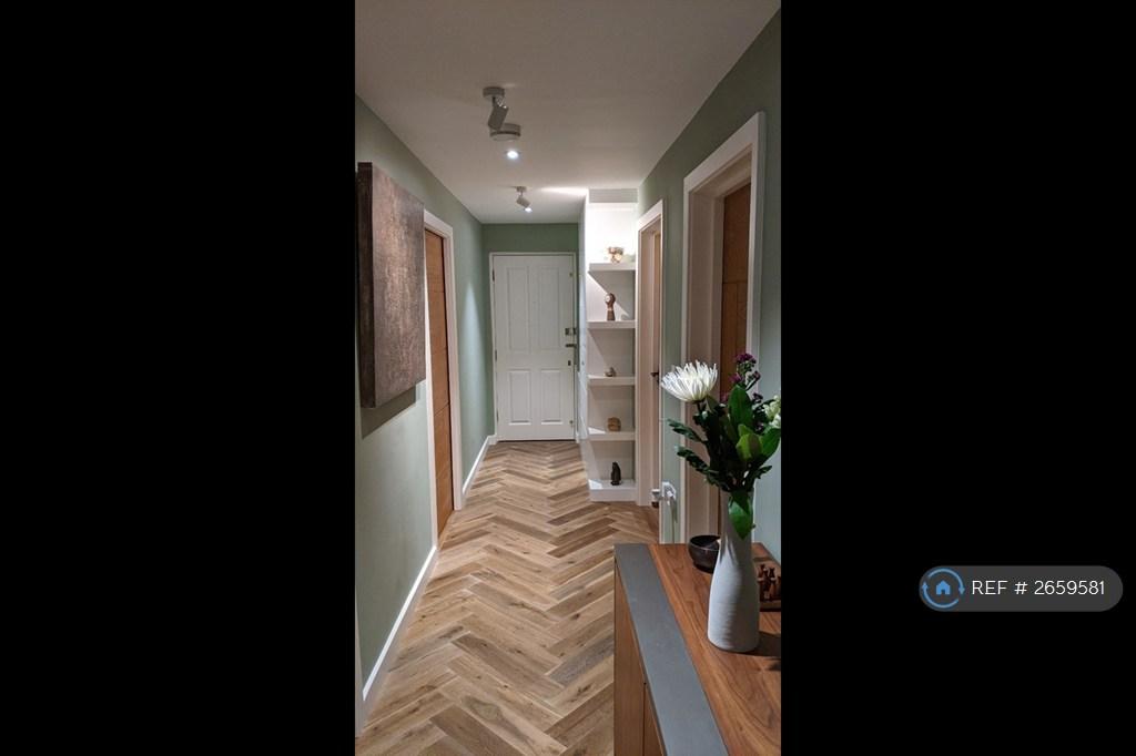 Corridor To Front Door With Custom Made Furniture