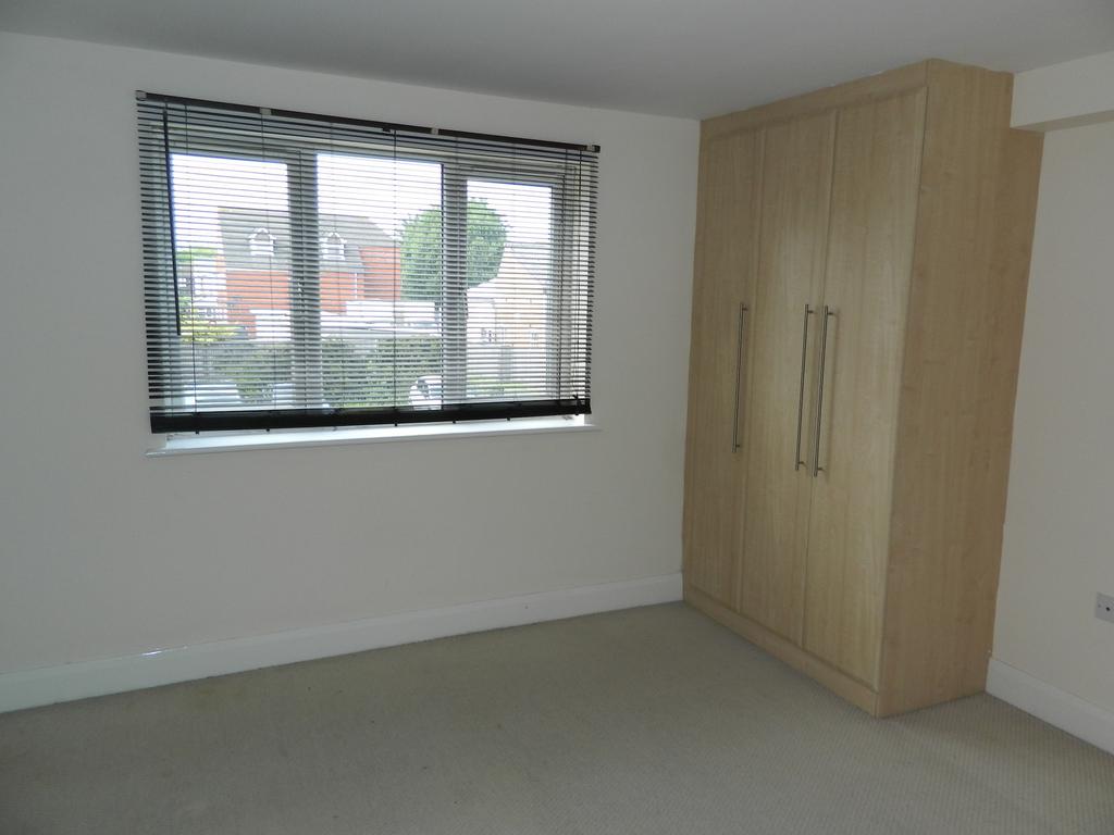Master bed with fitted wardrobes