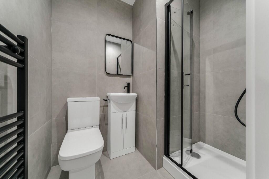 Modern and well-maintained bathroom with a larg...
