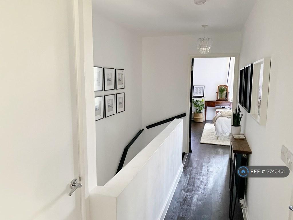 Upper Hallway With Stairs Leading Down To 1st