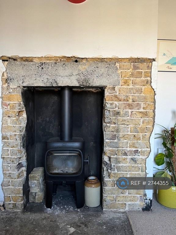 Wood Burning Stove (Sitting Room)