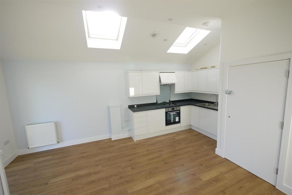 Living room with open plan kitchen