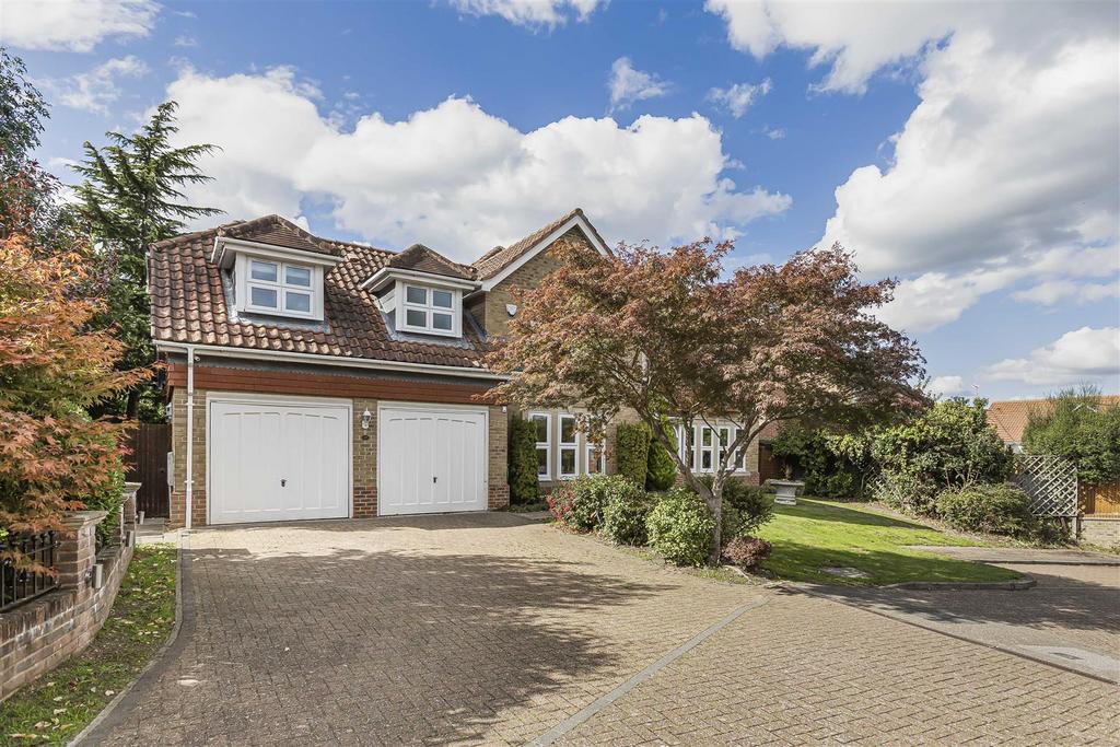 Double garage and own driveway: