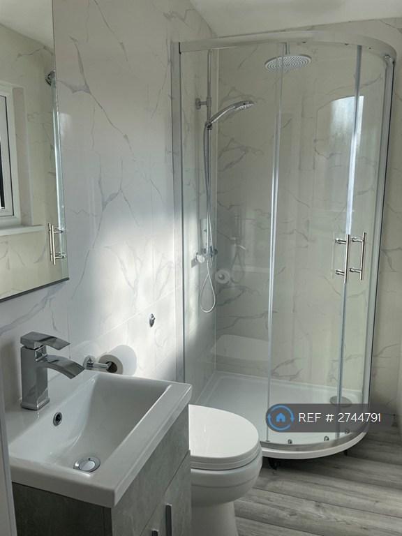 En-Suite With Toilet, Shower And Sink