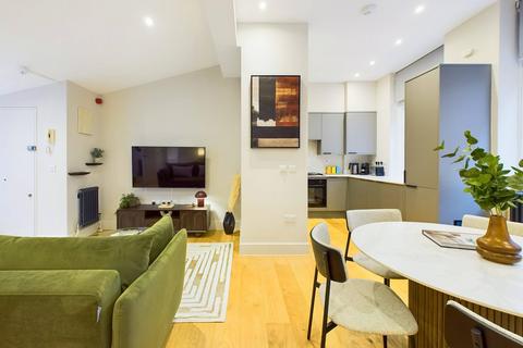 1 bedroom serviced apartment to rent, Denman Street, London W1D