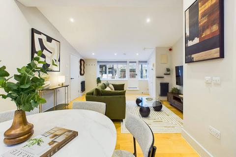 1 bedroom serviced apartment to rent, Denman Street, London W1D